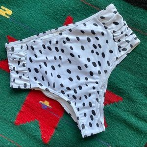 Never worn! Cheeky, high waisted, swim bottoms.